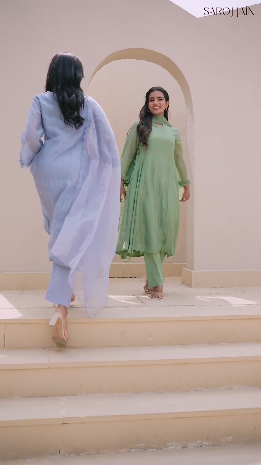 This fern green Mal Chanderi set features an A-line kurta with a slit neckline and full sleeves, adorned with delicate Mukesh work. It includes a comfortable cotton pant with a half-elastic waist and pull-up closure, paired with a graceful organza dupatta—perfect for festive and elegant occasions.